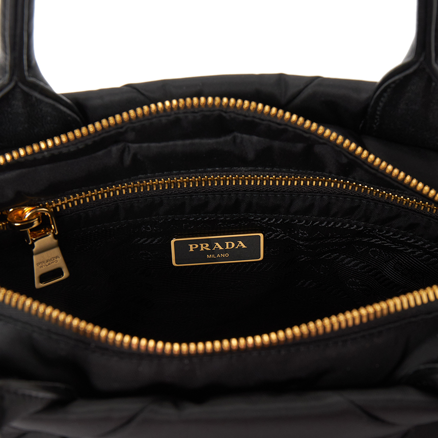 프라다(PRADA) 스몰 리나일론 패딩 여성 토트백 1BG373 RDJN F0632 B9M