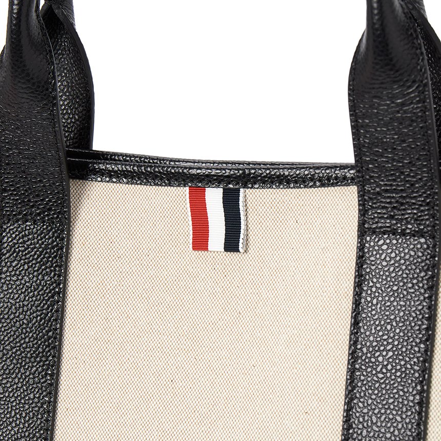 톰브라운(THOM BROWNE) 남성 토트백 MAG389A F0492 001