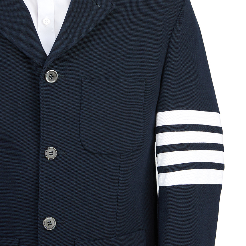 톰브라운(THOM BROWNE) 사선 스트라이프 바시티 남자 스포츠 자켓 MJT344A J0008 415