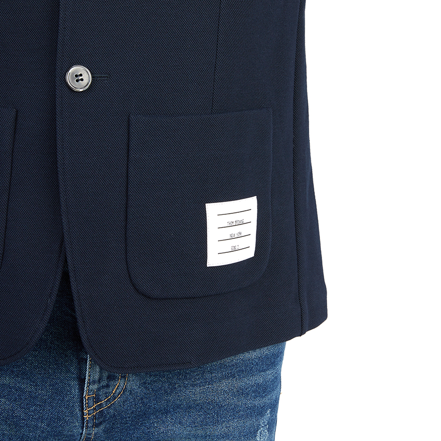톰브라운(THOM BROWNE) 사선 스트라이프 바시티 남자 스포츠 자켓 MJT344A J0008 415